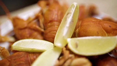 Cooked red crayfish on a wooden table in the fish restaurant of Georgia. Red cra Stock Footage 82529646