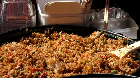 Cooked rice being served Stock Footage 115702137