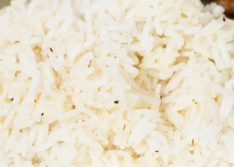Cooked rice closeup. Stock Photos