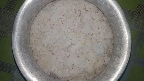 Cooked rice in a pot.4k video. Stock Footage 321828707