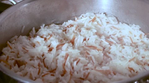 Cooked Rice with Vermicelli in Pot Stock Footage 322031961