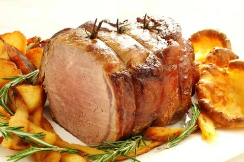 Cooked roast beef joint Stock Photos