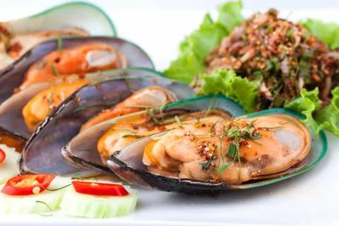 Cooked shellfish with spicy salad Stock Photos