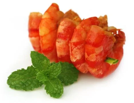 Cooked shrimp with mint leaves Stock Photos