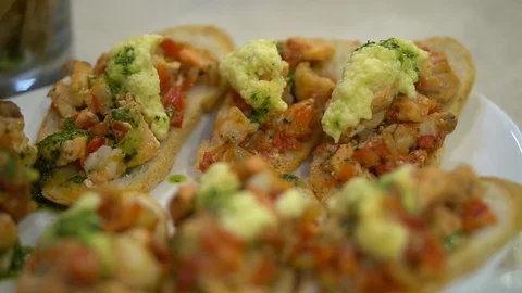 Cooked snacks on a table in a restaurant Stock Footage 107077761