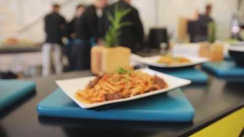 Cooked spaghetti carbonara in a plate on a table. Zooming camera. Video stock 74806374