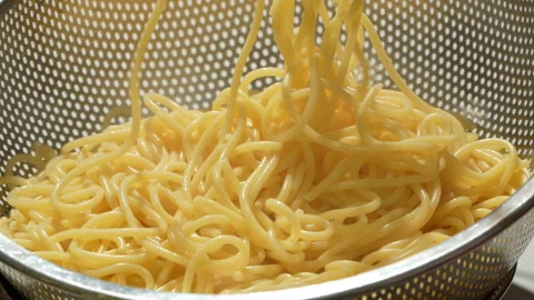 Cooked Spaghetti Pasta Drained in Colander Video stock 345772300