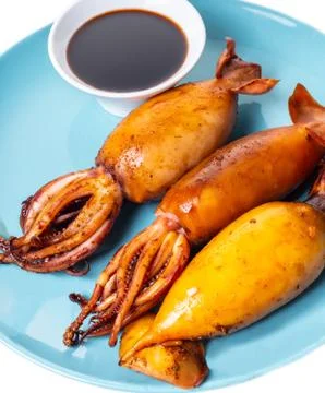 Cooked squid in a plate Stock Photos