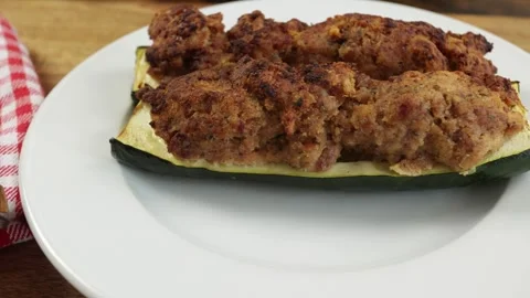 Cooked stuffed zucchini, close-up Video stock 246828362