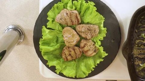 Cooked tenderloin steak on the plate. tracking shot Stock Footage 80011152