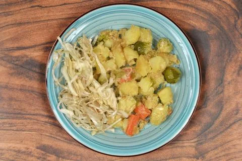 Cooked Vegetables in Breadcrumbs with Cabbage Stock Photos