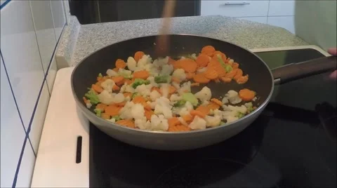 Cooked Vegetables on frying pan Stock Footage 46004284