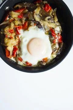 Cooked vegetables with poached egg Stock Photos