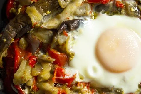 Cooked vegetables with poached egg Stock Photos