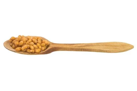 Cooked white beans on a spoon Stock Photos