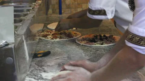 Cooker hands preparing pizza Video stock 12274362