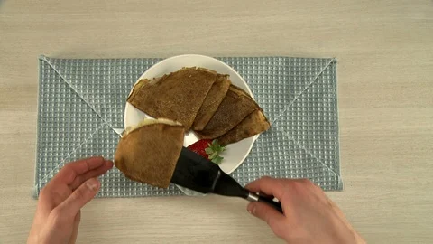 Cooker setting the plate of pancakes view Video stock 108201074