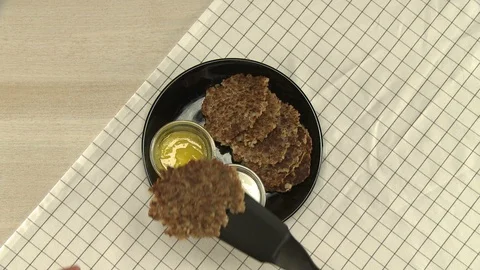 Cooker setting the table with cutlets video Video stock 108201683