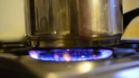 Cooker stove burning with pot Stock Footage 78626948