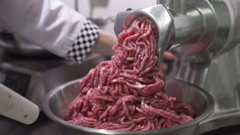 Cooker switches on chopper makes minced forcemeat indoors Stock Footage 72093191