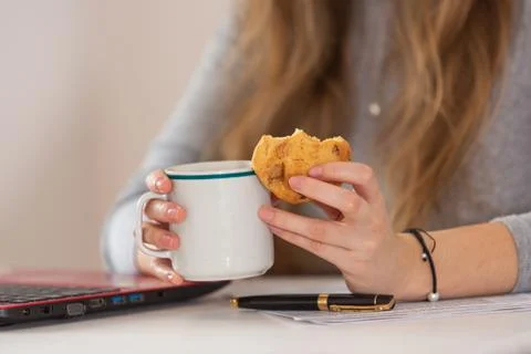 Cookie and cup of coffee close-up. Stock Photos