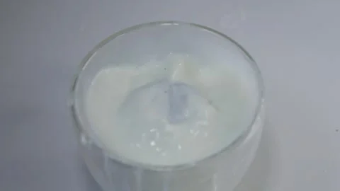 Cookie and the milk splash 動画素材 243954076