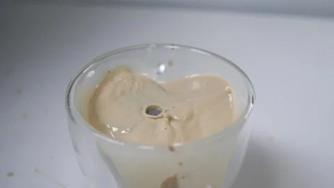 Cookie and the milk splash Stock Footage 243954089