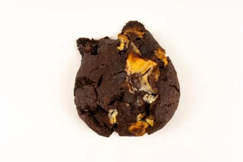 A cookie cake with chocolate on white background with copy space - top view Stock Photos