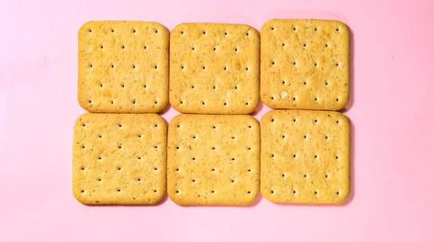 Cookie cracker close-up on a pink background. Foto stock
