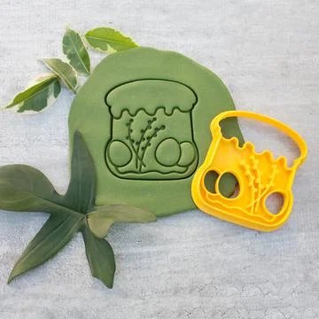 Cookie cutter for cutting Easter biscuits on dough for kids Stock Photos