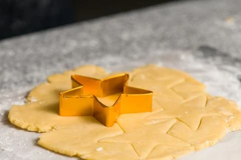 Cookie cutter on dough pre cutted dough Stock Photos