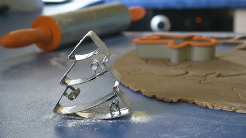 Cookie cutter in a shape of christmas tree going out of focus, 4K color graded Stock Footage 83667066