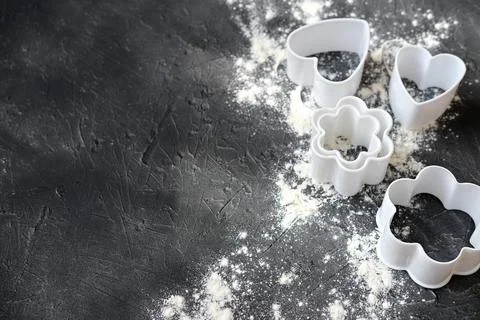 Cookie cutters on grey background. Stock Photos