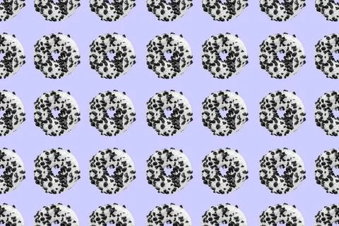 Cookie donut pattern on blue background Pattern made with black and white ... 스톡 사진