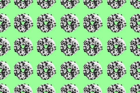 Cookie donut pattern on green background Stock Photos