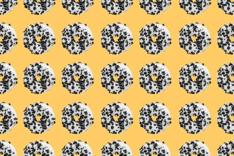 Cookie donut pattern on yellow background Stock Photos