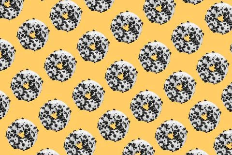 Cookie donut pattern on yellow background Stock Photos