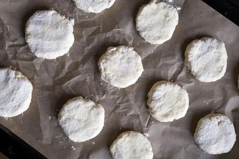 Cookie dough on baking paper. Culinary background. Stock Photos
