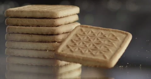 A cookie falls on a tower of cookies Stock Footage 198701537