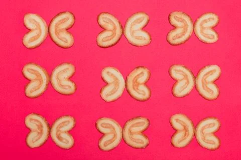 A cookie in the form of a heart lined up Stock Photos