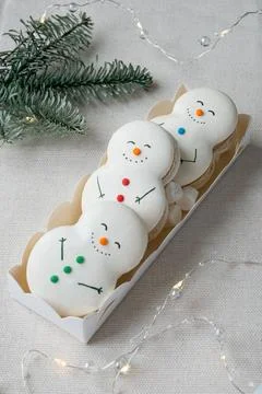 Cookie in the form of a snowman on gray table. New year mood Stock Photos