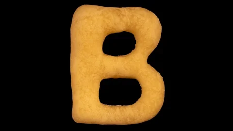 Cookie letter B, baking time lapse, include two versions writing and appear Stock Footage 124259925