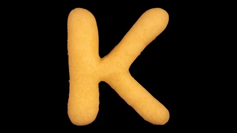 Cookie letter K, baking time lapse, include two versions writing and appear Stock Footage 124588126