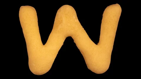 Cookie letter W, baking time lapse, include two versions writing and appear Stock Footage 124966326