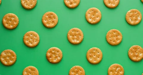 Cookie pattern on a green background. Looped 4k stop motion animation Stock Footage 235812175