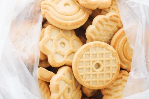 Cookie in plastic wrap packaging. Shortbread package. Stock Photos