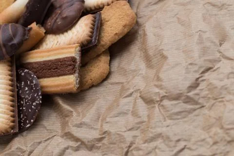 Cookies assorted on black background. Delicious morning snacks for breakfast Foto stock