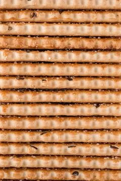 Cookies background. Stack of cripsy sweet chips biscuits Stock Photos