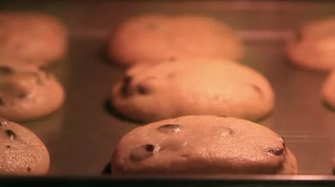 Cookies baking inside an oven Stock Footage 10734928