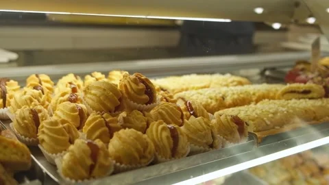 Cookies behind the window – desserts, cafe, buns, fresh pastries Stock Footage 308809606